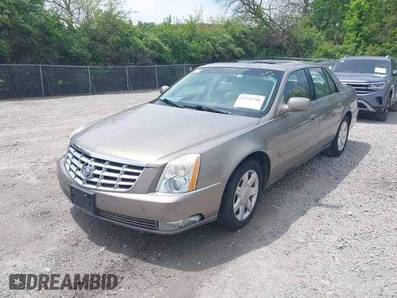 2006 Cadillac DTS 1SD z VIN 1G6KD57Y06U197794, wystawiony jako IAAI lot #42226706 z przebiegiem 135 748 mil mil oraz . Historia ofert i sprzedaży dostępna na DreamBid. Obrazek 22.