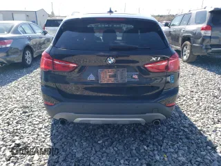 2016 BMW X1 xDrive28i z VIN WBXHT3C3XGP888701, wystawiony jako Copart lot #51409205 z przebiegiem 94 713 mil mil oraz Szkoda całkowita • Salvage title. Historia ofert i sprzedaży dostępna na DreamBid. Obrazek 6.