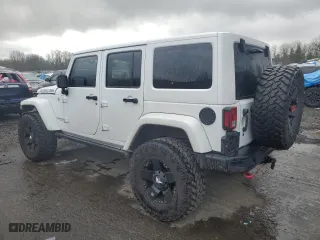 2015 Jeep Wrangler Unlimited Rubicon Hard Rock with VIN 1C4HJWFG8FL647910, listed as a Copart auction lot 46716605 with 48,139 mi miles and Salvage Title. Bid and sale history available at carsss.com. Image 2.