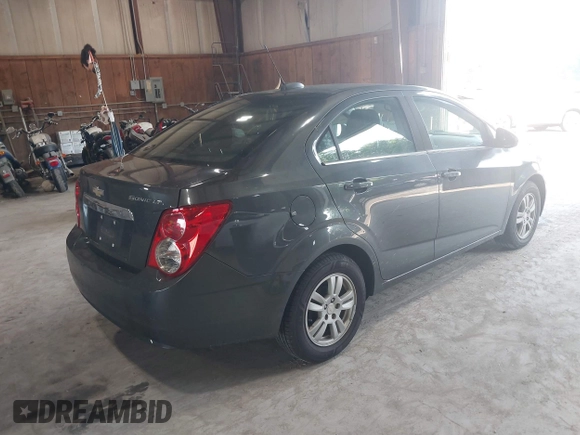 2016 Chevrolet Sonic LT z VIN 1G1JC5SH0G4170981, wystawiony jako IAAI lot #42576425 z przebiegiem 169 102 mil mil oraz . Historia ofert i sprzedaży dostępna na DreamBid. Obrazek 4.