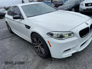 2014 BMW M5 with VIN WBSFV9C50ED097667, listed as a Copart auction lot 55102255 with 145,086 mi miles and Clean Title. Bid and sale history available at carsss.com. Image 1.