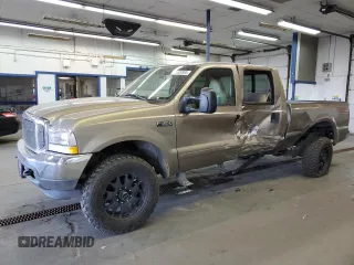 2003 Ford F-350 XL with VIN 1FTSW31F83EB16940, listed as a Copart auction lot 74629904 with 243,455 mi miles and Salvage Title. Bid and sale history available at DreamBid. Image 1.