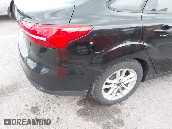 2016 Ford Focus SE with VIN 1FADP3F29GL245580, listed as a IAAI auction lot 41924810 with 111,090 mi miles and . Bid and sale history available at DreamBid. Image 12.