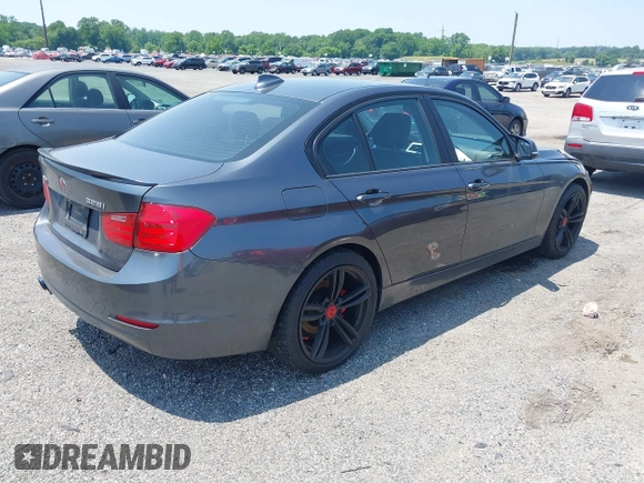2013 BMW 3 Series 328i xDrive with VIN WBA3B5G54DNS00777, listed as a IAAI auction lot 42433605 with 196,092 mi miles and . Bid and sale history available at DreamBid. Image 4.
