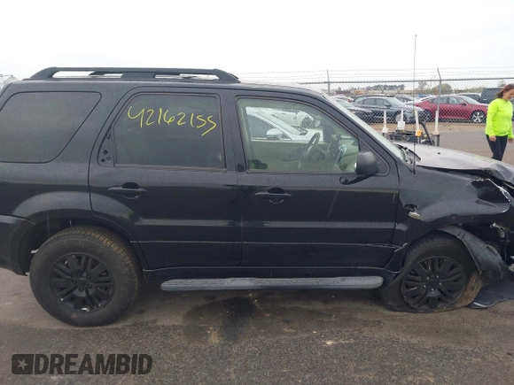 2005 Mercury Mariner Luxury z VIN 4M2CU57115DJ33938, wystawiony jako IAAI lot #42162155 z przebiegiem 174 834 mil mil oraz . Historia ofert i sprzedaży dostępna na DreamBid. Obrazek 13.