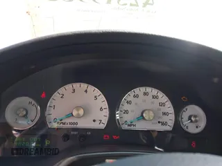 2003 Ford Thunderbird Deluxe z VIN 1FAHP60A53Y101461, wystawiony jako IAAI lot #42519933 z przebiegiem 64 820 mil mil oraz . Historia ofert i sprzedaży dostępna na DreamBid. Obrazek 7.