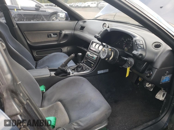 1989 Nissan Skyline z VIN HNR32002973, wystawiony jako Copart lot #73699504 z przebiegiem 72 824 mil mil oraz Szkoda całkowita • Salvage title. Historia ofert i sprzedaży dostępna na DreamBid. Obrazek 7.