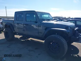 2020 Jeep Gladiator Sport S with VIN 1C6JJTAG6LL190749, listed as a IAAI auction lot 41401209 with 97,292 mi miles and . Bid and sale history available at DreamBid. Image 1.
