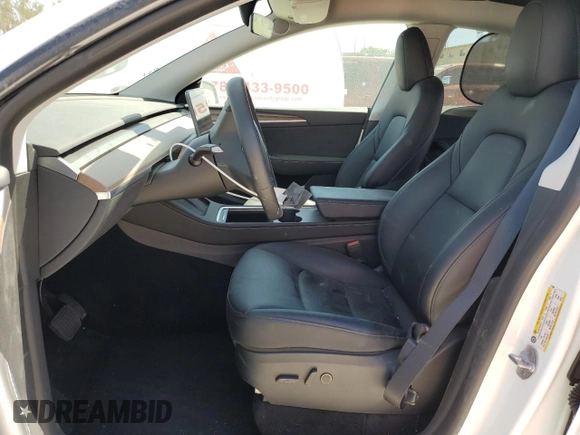 2023 Tesla Model Y Long Range with VIN 7SAYGDEEXPF770800, listed as a Copart auction lot 48324515 with 25,205 mi miles and Salvage Title. Bid and sale history available at DreamBid. Image 7.