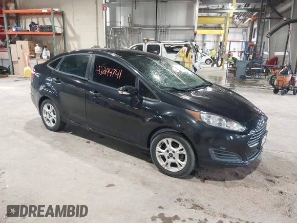 2014 Ford Fiesta SE z VIN 3FADP4BJ0EM174123, wystawiony jako IAAI lot #42294741 z przebiegiem 95 682 mil mil oraz . Historia ofert i sprzedaży dostępna na DreamBid. Obrazek 1.