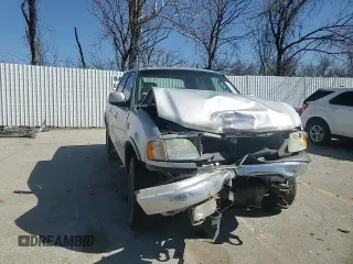 2003 Ford F-150 XLT with VIN 1FTRW08L03KD74119, listed as a Copart auction lot 47373105 with 303,513 mi miles and Salvage Title. Bid and sale history available at carsss.com. Image 10.