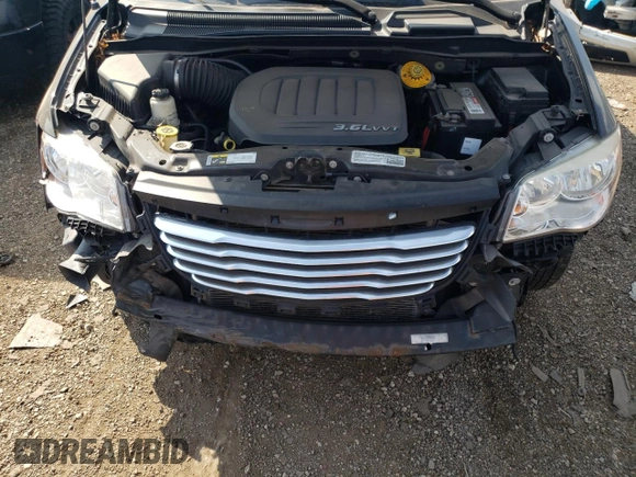 2014 Chrysler Town & Country Touring with VIN 2C4RC1BG2ER440037, listed as a Copart auction lot 69394284 with 125,978 mi miles and Salvage Title. Bid and sale history available at DreamBid. Image 12.