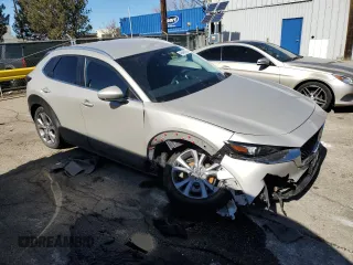 2023 Mazda CX-30 S Select with VIN 3MVDMBBM8PM571503, listed as a Copart auction lot 46948105 with 12,260 mi miles and Salvage Title. Bid and sale history available at DreamBid. Image 4.