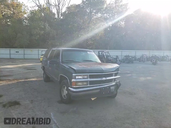 1997 Chevrolet Suburban with VIN 3GNEC16R6VG167319, listed as a Copart auction lot 77485194 with 188,479 mi miles and Salvage Title. Bid and sale history available at carsss.com. Image 12.