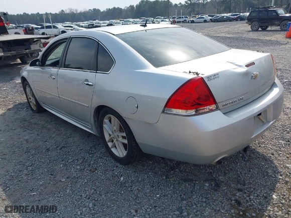 2013 Chevrolet Impala LTZ with VIN 2G1WC5E33D1200858, listed as a IAAI auction lot 41784028 with 191,138 mi miles. Bid and sale history available at carsss.com. Image 3.