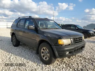 1999 Isuzu Rodeo S with VIN 4S2CK58W3X4362974, listed as a Copart auction lot 43155155 with 396,448 mi miles and Salvage Title. Bid and sale history available at DreamBid. Image 4.