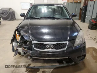 2010 Kia Rio with VIN KNADH4B37A6641845, listed as a Copart auction lot 51861215 with 163,894 mi miles and Salvage Title. Bid and sale history available at DreamBid. Image 5.