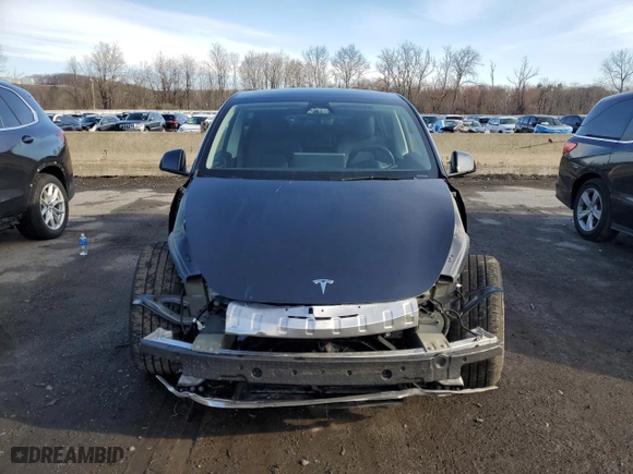 2024 Tesla Model Y with VIN 7SAYGDED1RF016792, listed as a Copart auction lot 50057345 with 6,749 mi miles and Salvage Title. Bid and sale history available at carsss.com. Image 5.