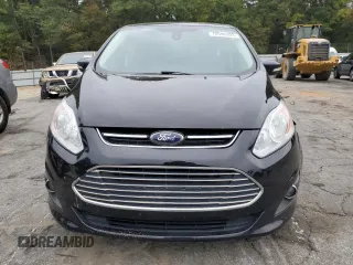2016 Ford C-Max Energi SEL with VIN 1FADP5CU2GL112497, listed as a Copart auction lot 70890503 with 84,276 mi miles. Bid and sale history available at carsss.com. Image 5.