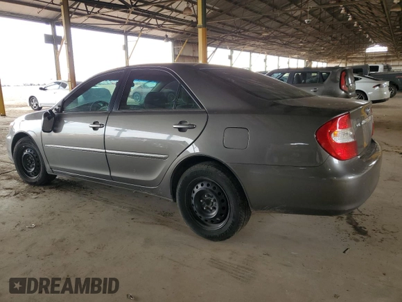 2004 Toyota Camry LE with VIN 4T1BE32K74U884720, listed as a Copart auction lot 49534195 with 253,516 mi miles and Salvage Title. Bid and sale history available at DreamBid. Image 2.