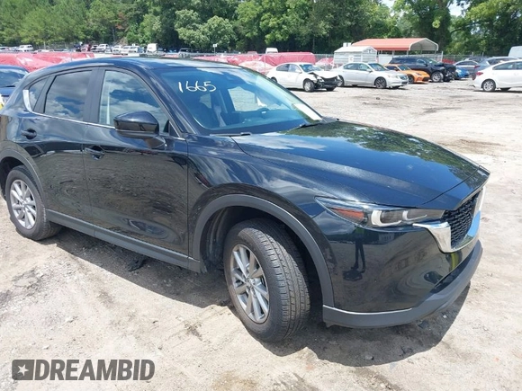 2023 Mazda CX-5 S Carbon Edition z VIN JM3KFBCMXP0201665, wystawiony jako IAAI lot #39965378 z przebiegiem 29 105 mil mil oraz . Historia ofert i sprzedaży dostępna na DreamBid. Obrazek 1.