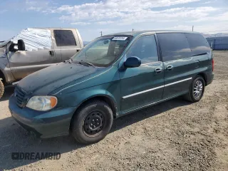 2002 Kia Sedona LX with VIN KNDUP131026325853, listed as a Copart auction lot 65872234 with 114,798 mi miles and Clean Title. Bid and sale history available at carsss.com. Image 1.