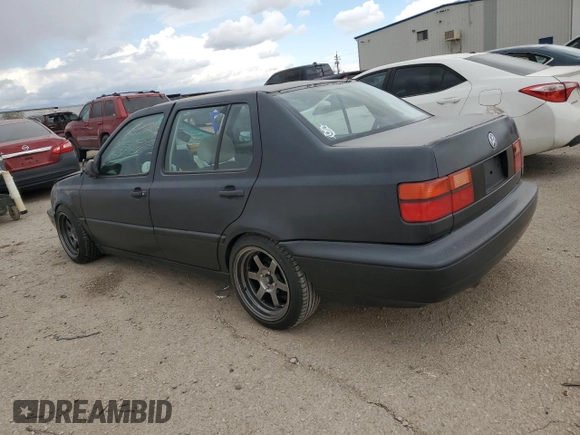 1996 Volkswagen Jetta с VIN 3VWRA81H5TM069238, выставлен на аукционе Copart как лот 42831195 с пробегом 226 935 миль миль и Списание • Salvage title. История ставок и продаж доступна на DreamBid. Изображение 2.