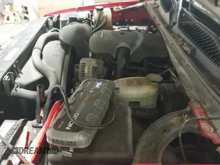 2004 GMC Sierra 1500 SLE z VIN 1GTEK19V94E330314, wystawiony jako IAAI lot #43367115 z przebiegiem 299 765 mil mil oraz . Historia ofert i sprzedaży dostępna na DreamBid. Obrazek 19.