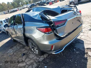 2020 Lexus RX with VIN JTJJGKFA7L2013877, listed as a IAAI auction lot 40678497 with 67,271 mi miles. Bid and sale history available at carsss.com. Image 3.