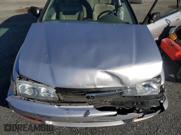 1997 Honda Accord LX with VIN 1HGCD723XVA033754, listed as a Copart auction lot 85194774 with 77,269 mi miles and Salvage Title. Bid and sale history available at carsss.com. Image 12.