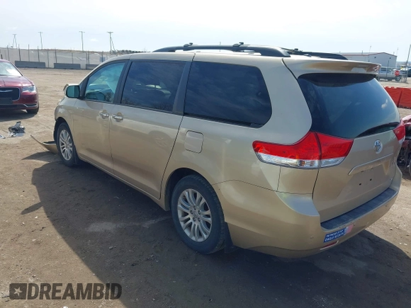 2012 Toyota Sienna XLE AAS with VIN 5TDYK3DC0CS202891, listed as a IAAI auction lot 41938594 with Not Provided miles and . Bid and sale history available at carsss.com. Image 3.