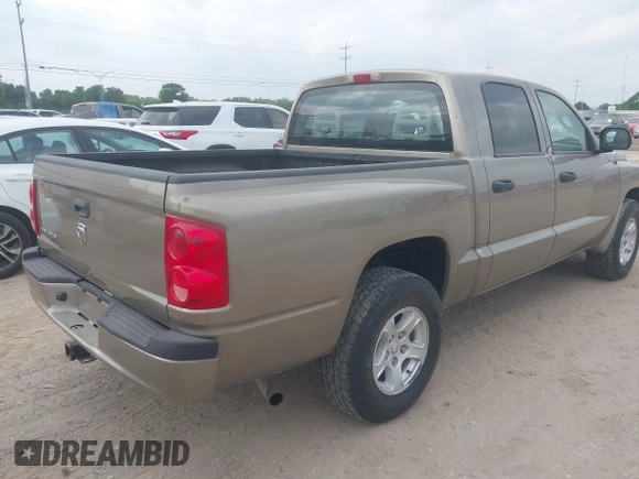 2006 Dodge Dakota SLT with VIN 1D7HE48N16S703072, listed as a IAAI auction lot 42156709 with 102,919 mi miles. Bid and sale history available at carsss.com. Image 4.