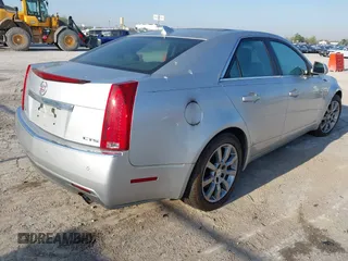 2009 Cadillac CTS RWD with VIN 1G6DV57V590125951, listed as a IAAI auction lot 42005788 with 160,133 mi miles and . Bid and sale history available at carsss.com. Image 4.