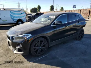2020 BMW X2 sDrive28i with VIN WBXYH9C03L5N88532, listed as a Copart auction lot 80123494 with 80,521 mi miles and Salvage title. Bid and sale history available at DreamBid. Image 1.