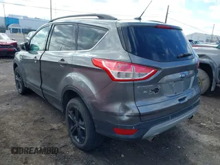 2014 Ford Escape SE with VIN 1FMCU9GX3EUB26129, listed as a IAAI auction lot 41987470 with 139,005 mi miles. Bid and sale history available at carsss.com. Image 3.