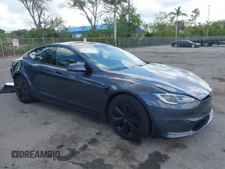 2023 Tesla Model S with VIN 5YJSA1E59PF502274, listed as a IAAI auction lot 42171490 with 45,582 mi miles and . Bid and sale history available at DreamBid. Image 1.