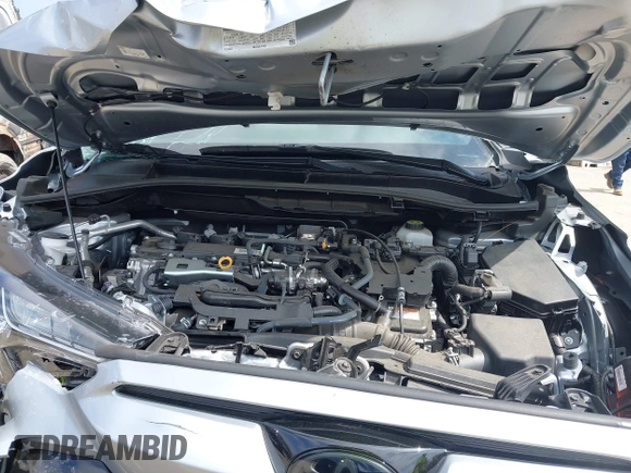 2023 Toyota Corolla Cross Hybrid S with VIN 7MUFBABG1PV014992, listed as a IAAI auction lot 42202656 with 18,913 mi miles and . Bid and sale history available at DreamBid. Image 10.