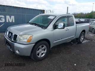 2005 Nissan Titan XE with VIN 1N6BA06A75N567013, listed as a IAAI auction lot 41971758 with 253,664 mi miles. Bid and sale history available at carsss.com. Image 2.