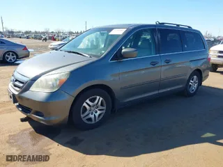 2007 Honda Odyssey EX-L with VIN 5FNRL386X7B405321, listed as a IAAI auction lot 41703384 with 198,552 mi miles. Bid and sale history available at carsss.com. Image 2.