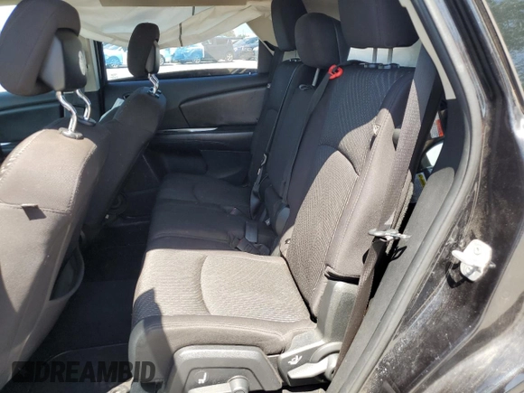 2013 Dodge Journey American Value with VIN 3C4PDCAB6DT709996, listed as a Copart auction lot 52362635 with 104,808 mi miles and Salvage Title. Bid and sale history available at DreamBid. Image 11.