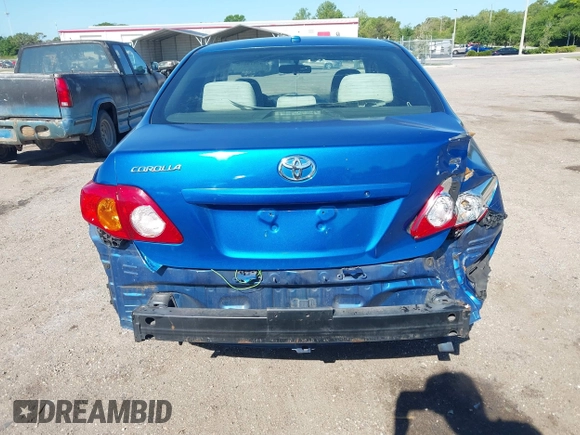 2009 Toyota Corolla with VIN JTDBL40E999021523, listed as a IAAI auction lot 42019856 with 194,011 mi miles. Bid and sale history available at carsss.com. Image 17.