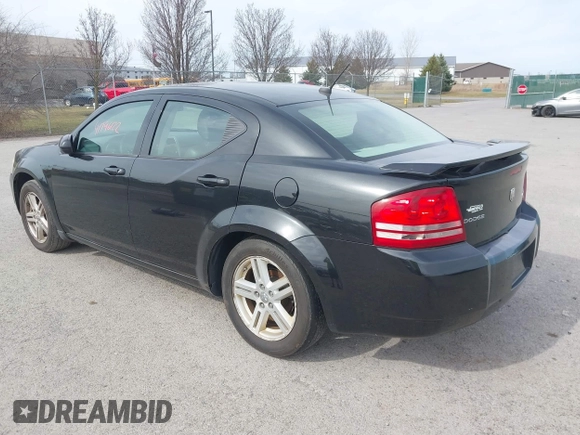 2009 Dodge Avenger SXT with VIN 1B3LC56B49N570157, listed as a IAAI auction lot 41796122 with 164,571 mi miles. Bid and sale history available at carsss.com. Image 3.