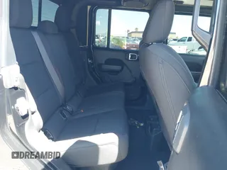 2023 Jeep Gladiator Rubicon z VIN 1C6JJTBG3PL531982, wystawiony jako IAAI lot #42211139 z przebiegiem 28 301 mil mil oraz . Historia ofert i sprzedaży dostępna na DreamBid. Obrazek 8.