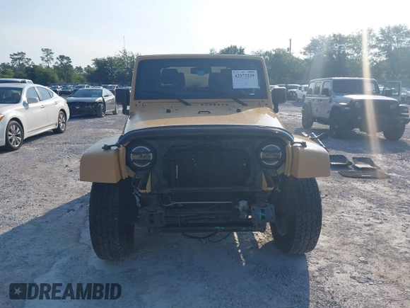2013 Jeep Wrangler Arctic z VIN 1C4GJWBG2DL634942, wystawiony jako IAAI lot #42373239 z przebiegiem 131 470 mil mil oraz . Historia ofert i sprzedaży dostępna na DreamBid. Obrazek 13.