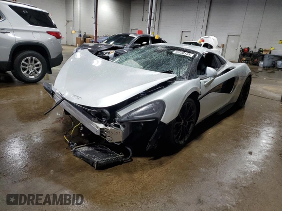 2018 McLaren 570S z VIN SBM13FAA2JW004594, wystawiony jako Copart lot #49730155 z przebiegiem Nie podano mil oraz Szkody całkowita. Historia ofert i sprzedaży dostępna na DreamBid. Obrazek 1.