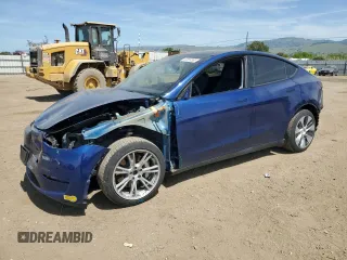 2021 Tesla Model Y Long Range with VIN 5YJYGDEE7MF114420, listed as a Copart auction lot 53889365 with 74,363 mi miles and Salvage Title. Bid and sale history available at DreamBid. Image 1.