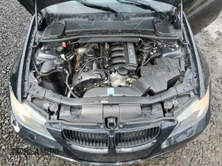 2007 BMW 3 Series 328xi with VIN WBAVC93517KX58143, listed as a Copart auction lot 52036035 with 161,954 mi miles and Salvage title. Bid and sale history available at DreamBid. Image 11.