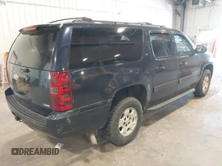 2009 Chevrolet Suburban LT w/1LT with VIN 1GNFK26319R272557, listed as a IAAI auction lot 42138238 with 223,599 mi miles. Bid and sale history available at carsss.com. Image 4.