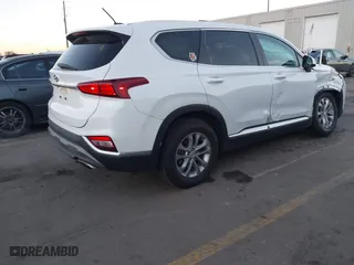 2019 Hyundai Santa Fe SE with VIN 5NMS23AD9KH077362, listed as a IAAI auction lot 41890584 with 132,476 mi miles. Bid and sale history available at carsss.com. Image 4.
