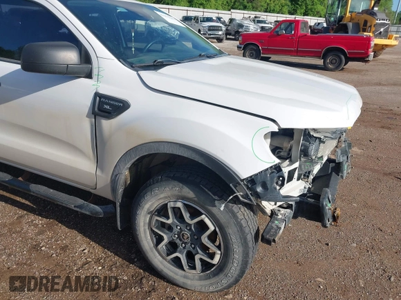 2021 Ford Ranger XL with VIN 1FTER1EH3MLD17114, listed as a IAAI auction lot 41972203 with 38,010 mi miles and . Bid and sale history available at DreamBid. Image 18.